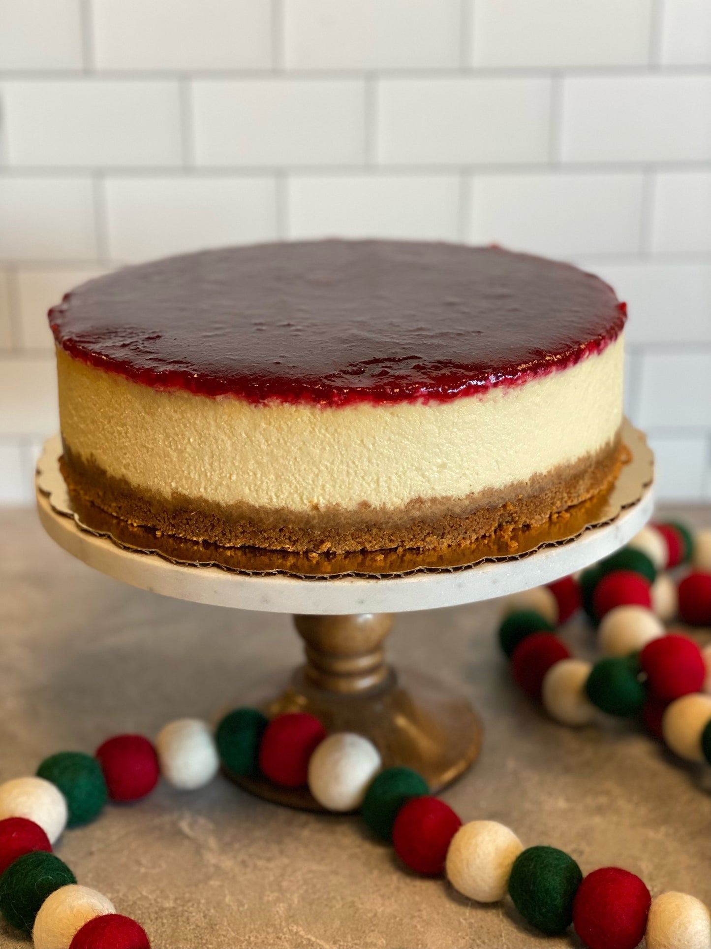 Vanilla Bean Cheesecake with Cranberry Jewel Topping